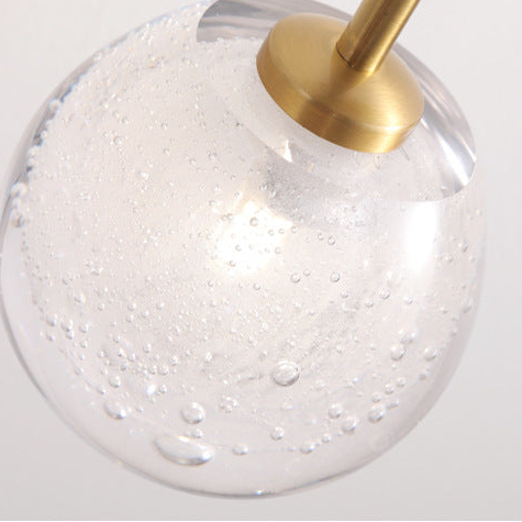 RoyaleGlow Modern Black & Gold Wall Sconce with Bubble Glass Globe