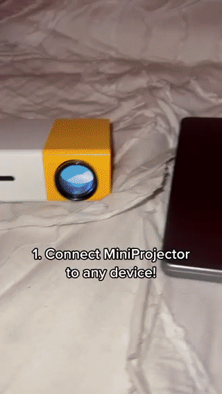 RoyaleGlow Mini Movie Projector for Home Theater Fun