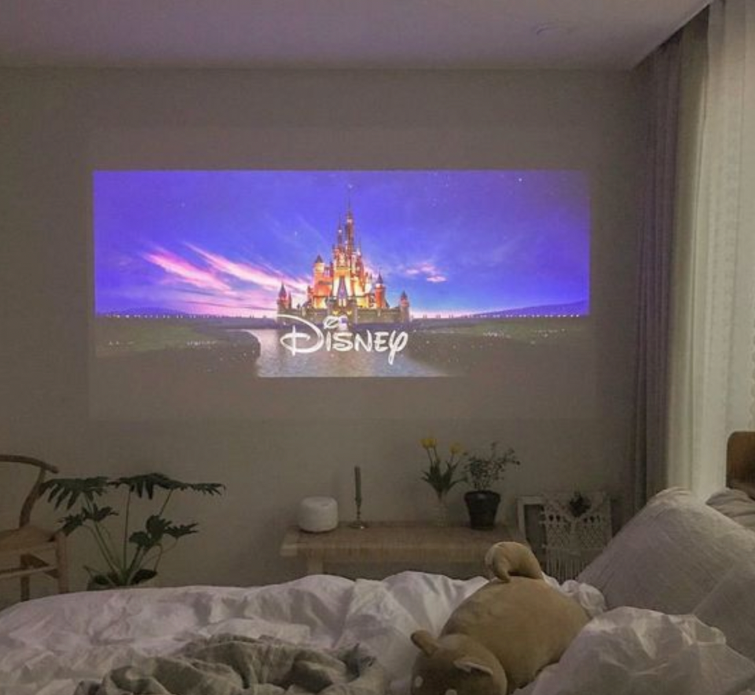 RoyaleGlow Mini Movie Projector for Home Theater Fun