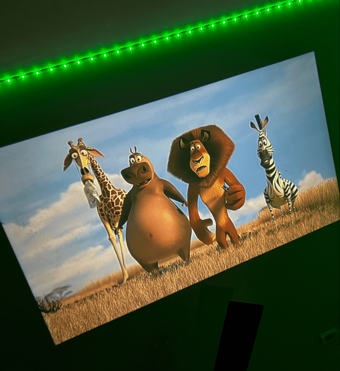 RoyaleGlow Mini Movie Projector for Home Theater Fun