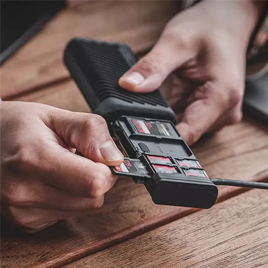 Type-C SD TF SIM Card Reader – High-speed USB 3.1 card reader with 312MB/s transfer speed. Dual SD & TF card slots, stores 4 SD, 4 TF, and 2 Nano-SIM cards. Durable aluminum shell, IP54 waterproof, shockproof, and travel-friendly with slide-out design and carabiner clip. Compatible with Windows, Mac, Linux, and Android.