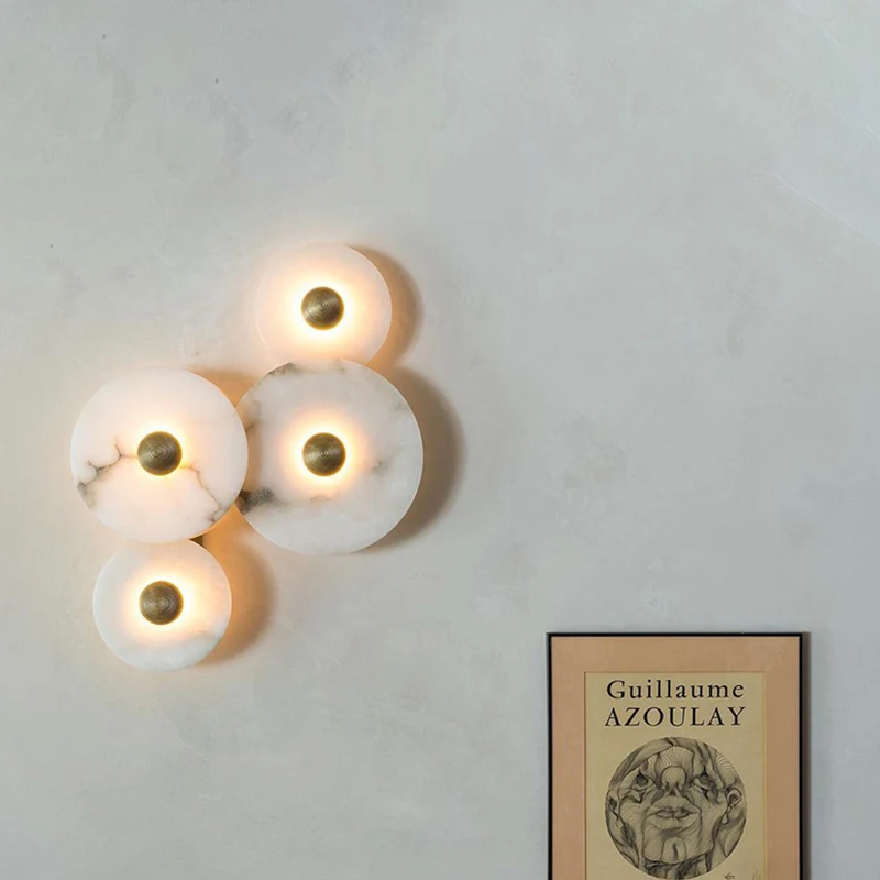 LuxRoyale Round Alabaster Wall Lamp With Fluted Brass Center And Hidden LED Glow