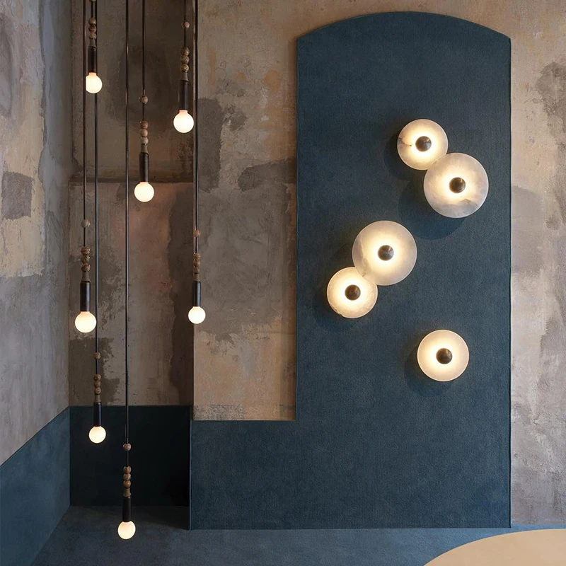 LuxRoyale Round Alabaster Wall Lamp With Fluted Brass Center And Hidden LED Glow