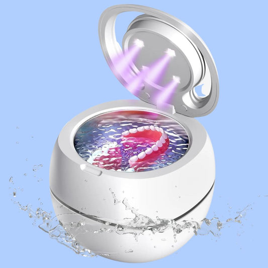 Ultrasonic portable denture cleaner with 42,000Hz deep-cleaning frequency. Compact, quiet, and energy-efficient design for hygienic plaque removal. Battery-operated and travel-friendly with stainless steel construction