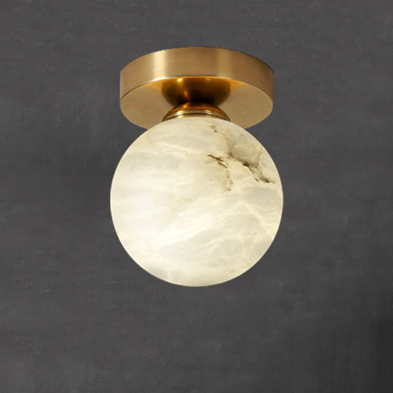 RoyaleGlow Brass & Marble Globe Flush Mount Ceiling Light