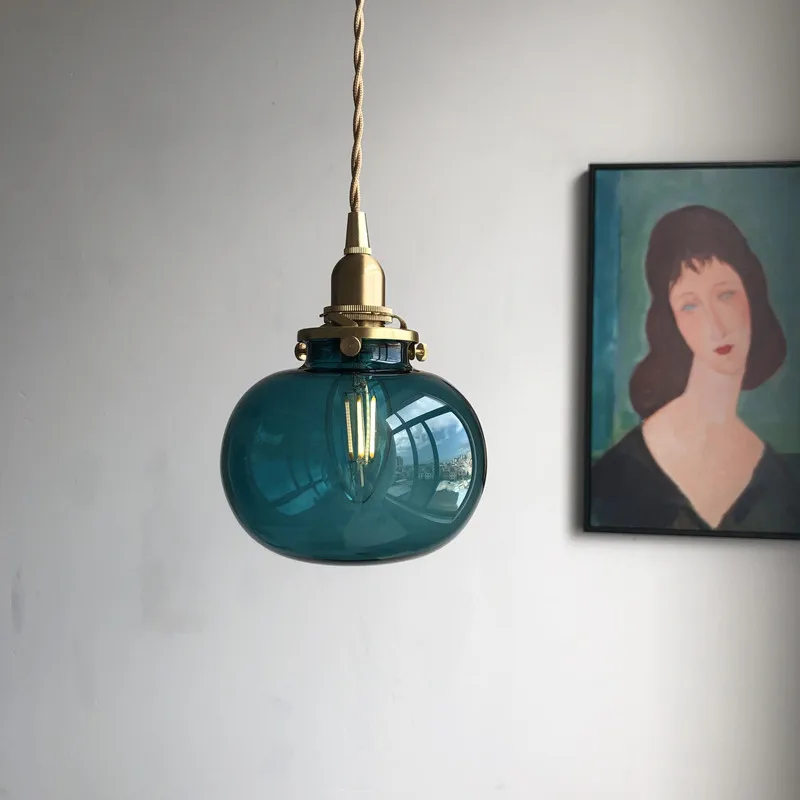 Lumora Hand-Blown Teal Glass Orb Pendant Light with Brushed Brass