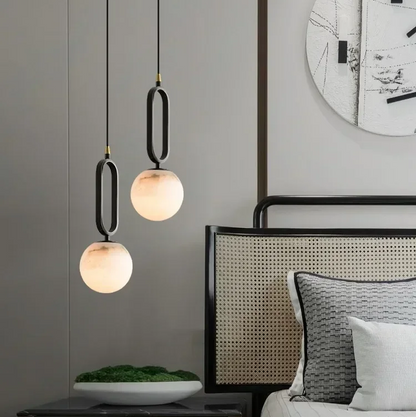 RoyaleGlow Alabaster Globe Pendant Light with Matte Black Loop Frame