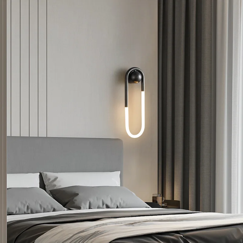 LuxRoyale Sculptural Loop Silhouette Wall Lamp in Brass Finish