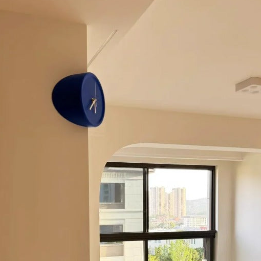 Royelux Contemporary Orange Wall Clock with Architectural Corner Fit