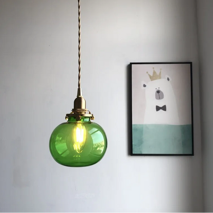 Lumora Hand-Blown Teal Glass Orb Pendant Light with Brushed Brass