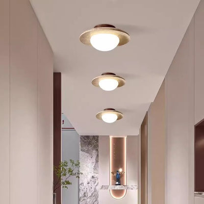 Lumora Sculptural Travertine Ceiling Light with Frosted Globe