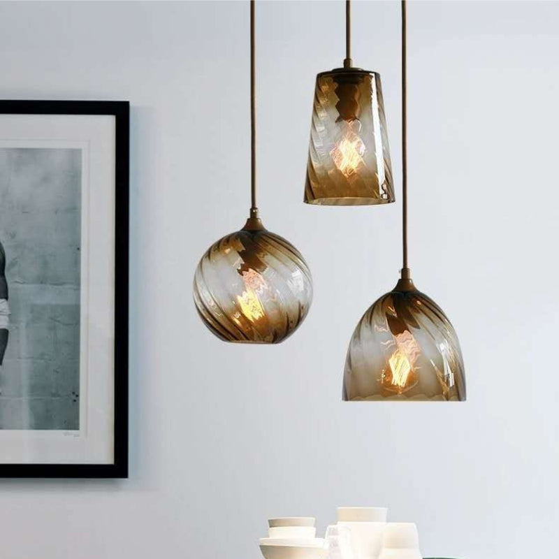 RoyaleGlow Modern Amber Swirl Glass Pendant Light - E26/E27 Adjustable Hanging Lamp