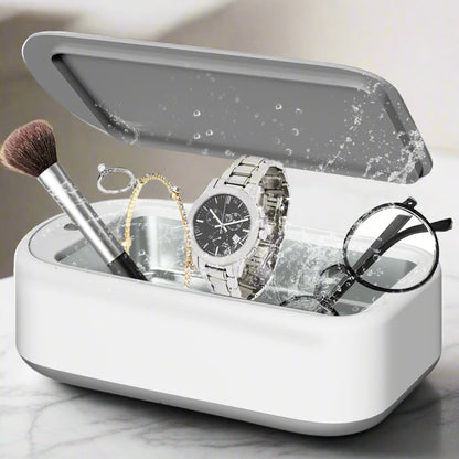 Ultrasonic jewelry cleaner machine with 48KHz deep cleaning power. 640ml capacity for glasses, dentures, and rings. 360-degree gentle cleaning, noise reduction, and waterproof design for effortless stain removal.