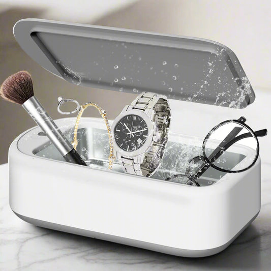 Ultrasonic jewelry cleaner machine with 48KHz deep cleaning power. 640ml capacity for glasses, dentures, and rings. 360-degree gentle cleaning, noise reduction, and waterproof design for effortless stain removal.