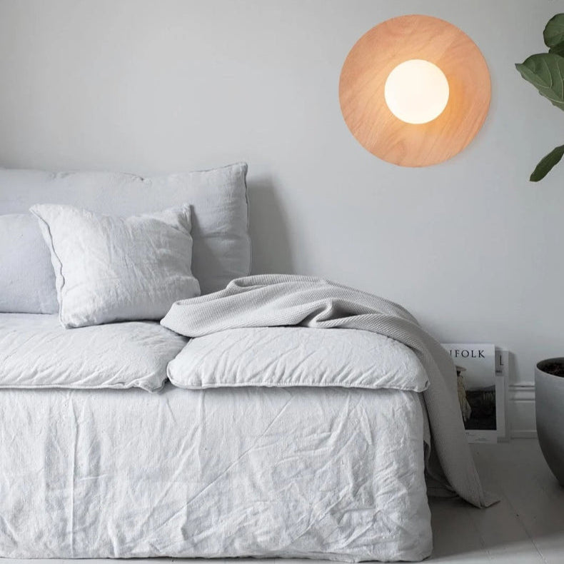 Lumora Modern Solid Wood Wall Light with Frosted Glass Globe