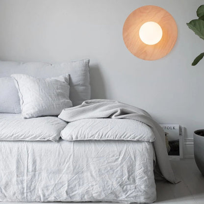 Lumora Modern Solid Wood Wall Light with Frosted Glass Globe