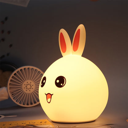 Squishy bunny night light with long ears, color-changing LED, and touch control, perfect for kids' bedrooms and cozy home decor.