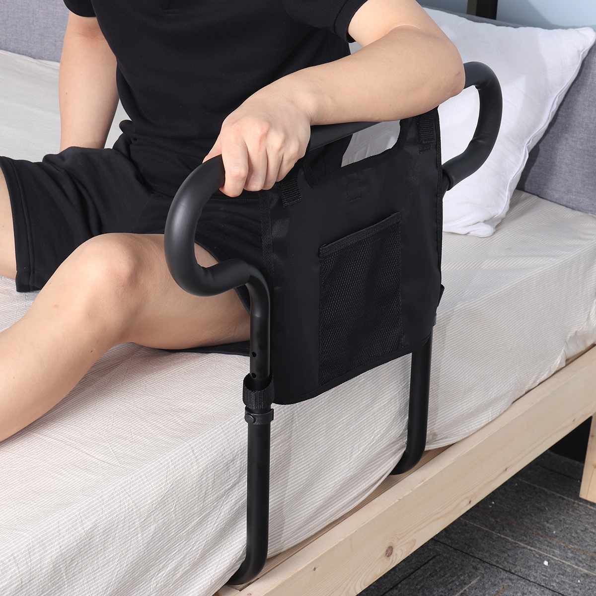 Heavy-duty senior bed rail with 136kg load capacity for safety and support. Features a storage pouch, universal compatibility, and easy installation. Ideal for seniors and individuals with limited mobility.