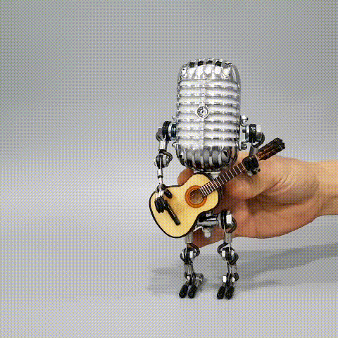 Handcrafted microphone robot lamp with adjustable joints and energy-saving LED light. Made from durable metal with a retro brass finish, perfect for music lovers. Includes a free guitar decoration.