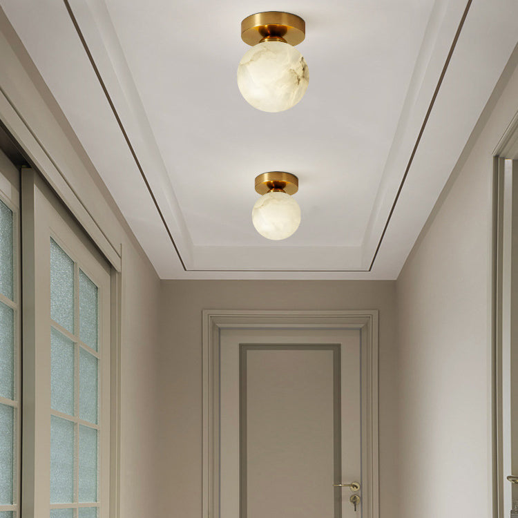 RoyaleGlow Brass & Marble Globe Flush Mount Ceiling Light