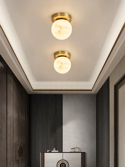 RoyaleGlow Alabaster Brass Flush Mount Ceiling Light - Modern Globe Fixture