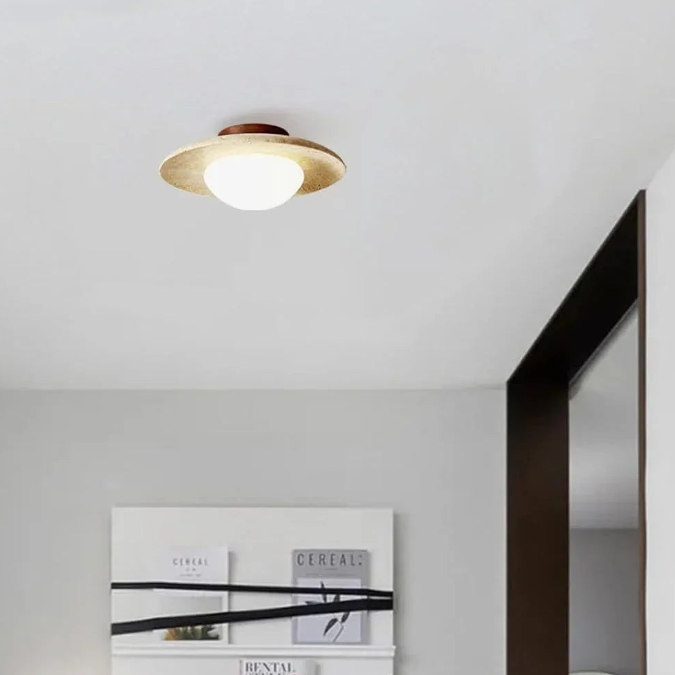 Lumora Sculptural Travertine Ceiling Light with Frosted Globe