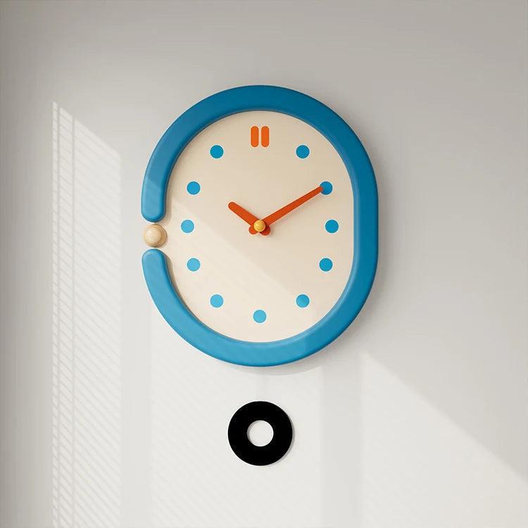 RoyaleGlow Minimalist Blue Oval Pendulum Wall Clock - Modern Aesthetic Home Decor-Royale Basic