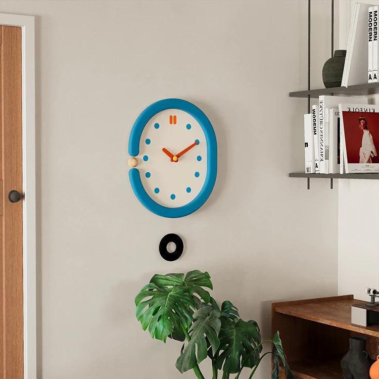 RoyaleGlow Minimalist Blue Oval Pendulum Wall Clock - Modern Aesthetic Home Decor-Royale Basic