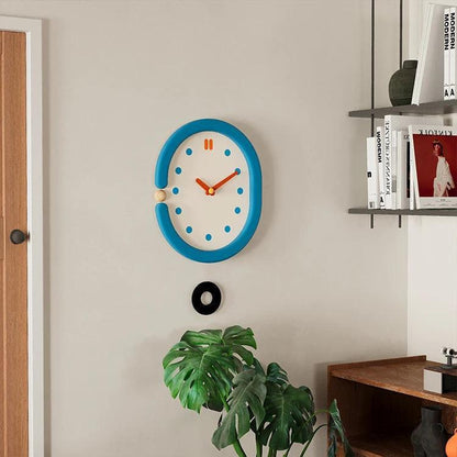 RoyaleGlow Minimalist Blue Oval Pendulum Wall Clock - Modern Aesthetic Home Decor-Royale Basic