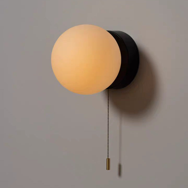 Rayvia Surface Mount Glass Globe Wall Sconce