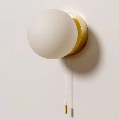 Rayvia Surface Mount Glass Globe Wall Sconce