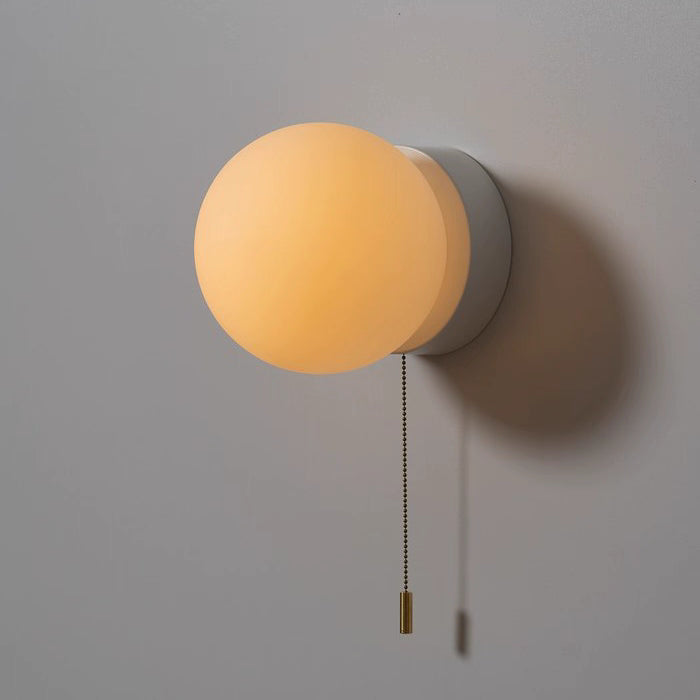 Rayvia Surface Mount Glass Globe Wall Sconce