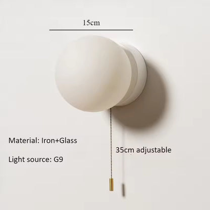 Rayvia Surface Mount Glass Globe Wall Sconce