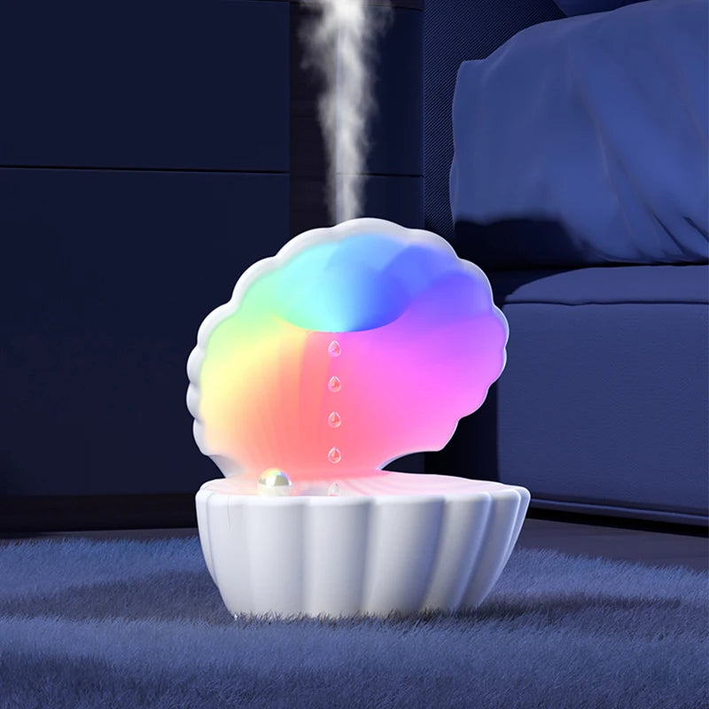 Shell-shaped Bluetooth speaker with RGB night light, anti-gravity air humidifier, and sleep aid features for relaxation and ambiance.