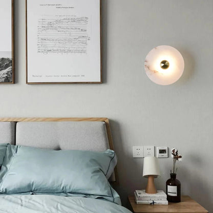 LuxRoyale Round Alabaster Wall Lamp With Fluted Brass Center And Hidden LED Glow