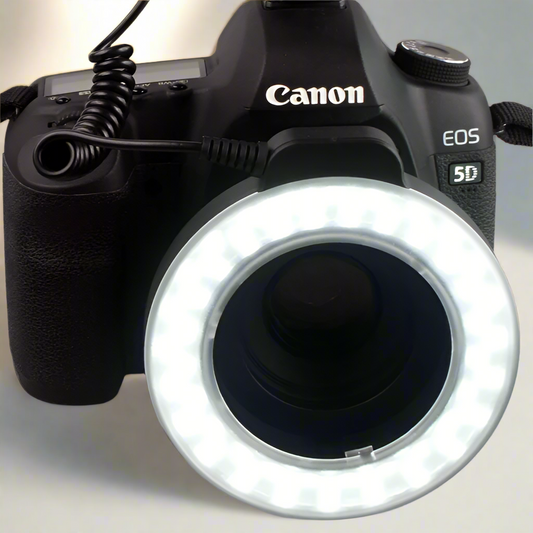 "Universal LED ring light for photography and videography with 48 super bright beads. Includes 6 adapter ring sizes, battery or DC-powered operation, and up to 3 hours of continuous lighting for professional-quality shots.