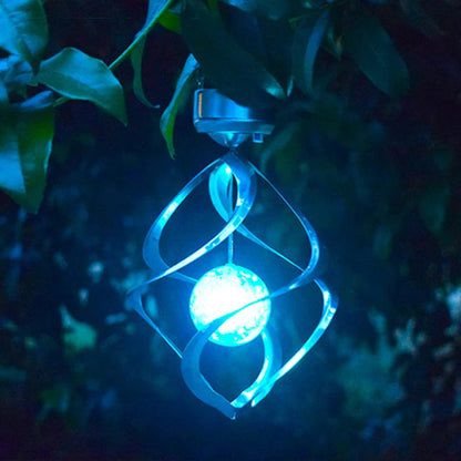 Solar-powered color-changing LED wind chime with spiral spinner design, weatherproof garden decor for patios, balconies, and outdoor spaces – elegant night light and soothing chime.