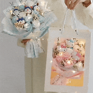 Hello Kitty flower bouquet with vinyl dolls, artificial flowers, wrapped in pink paper, perfect for gifts and special occasions.