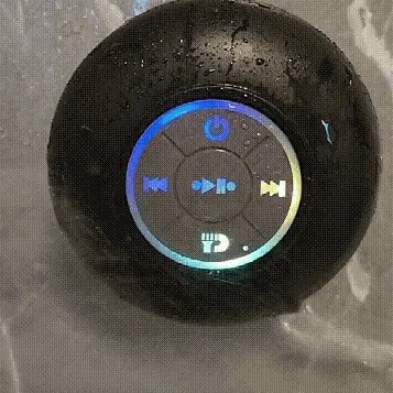 Waterproof Bluetooth shower speaker with suction cup, built-in mic, IPX7 rating, wireless connectivity, and 10-hour battery life – perfect for bathroom, pool, or beach.