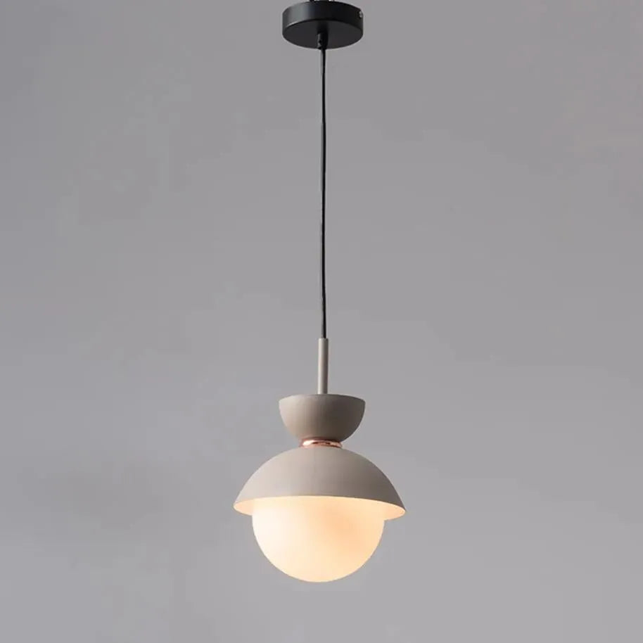 RoyaleGlow Mid-Century Modern Orb Pendant Light with Matte Metal & Glass Shade