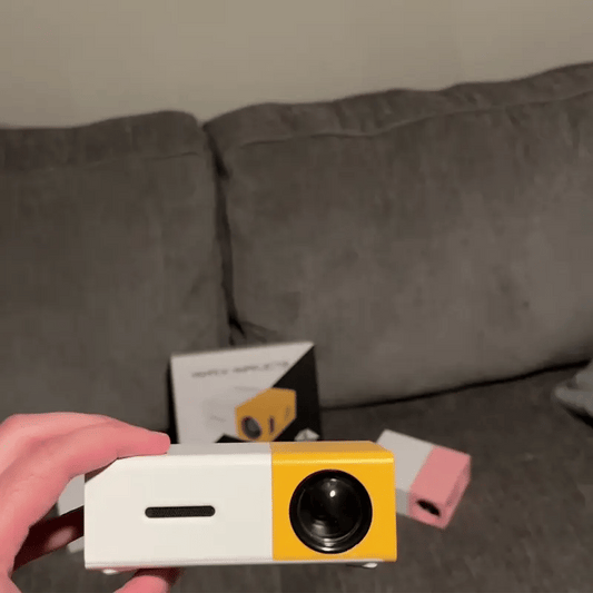 RoyaleGlow Mini Movie Projector for Home Theater Fun
