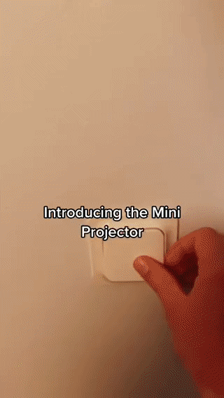 RoyaleGlow Mini Movie Projector for Home Theater Fun