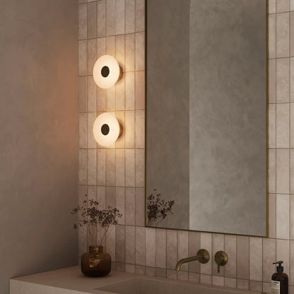 LuxRoyale Round Alabaster Wall Lamp With Fluted Brass Center And Hidden LED Glow