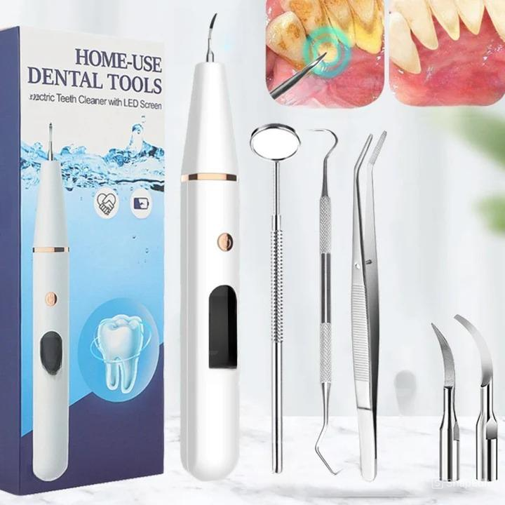 Ultrasonic plaque remover with 38 kHz vibrations, LED light, and two cleaning heads for surface and interdental care. USB rechargeable, gum-safe sensor, and overheating protection for professional dental hygiene at home
