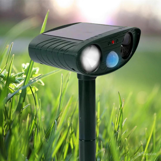 Solar-powered ultrasonic rabbit repeller with motion sensor and flashing lights. Humane pest deterrent for gardens and lawns. Covers up to 2,425 sq. ft. Weather-resistant and energy-efficient with rechargeable batteries.