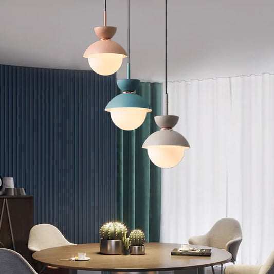 RoyaleGlow Mid-Century Modern Orb Pendant Light with Matte Metal & Glass Shade